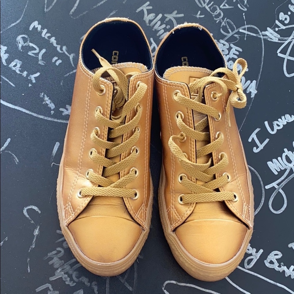 Gold Women’s Converse sneakers